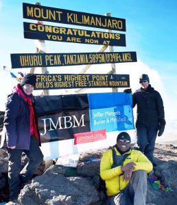 Capoccia, Oketch and Bonstelle at the peak of Kilimanjaro.